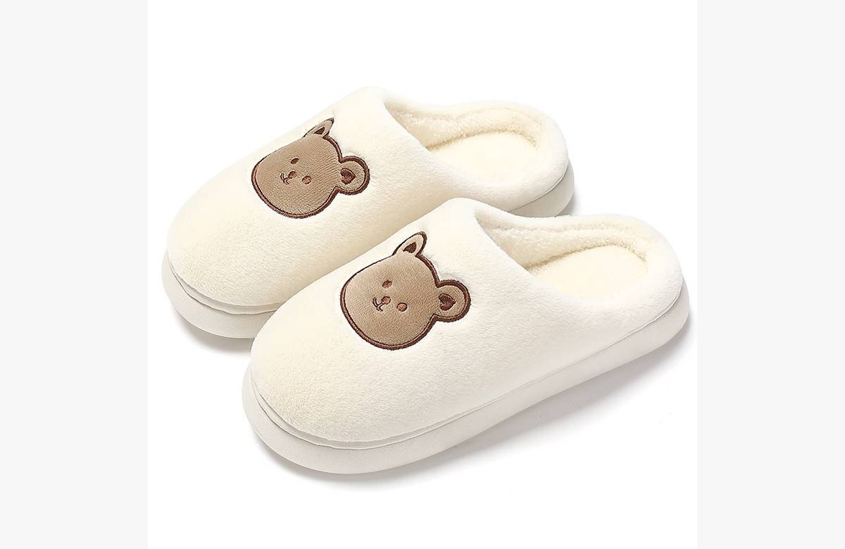 ¡Consigue tus zapatillas de felpa con diseño de oso de dinosaurio y mantén tus pies acogedores en casa!