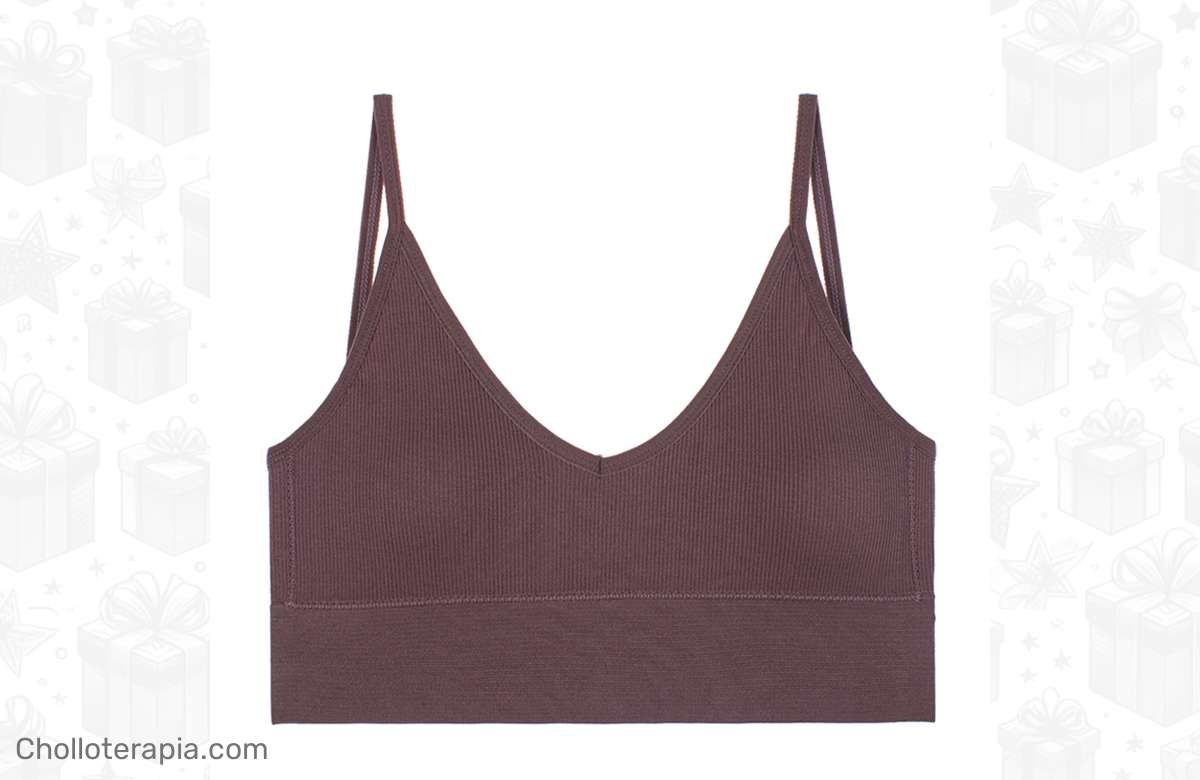 ¡Arrasa con el look más hot del verano! Camiseta sin mangas con espalda descubierta y top corto acolchado. ¡No te quedes sin ella!